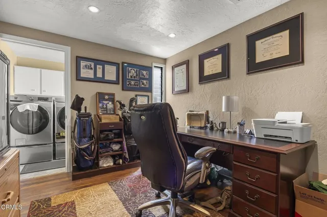 a swimming pool with patio outdoor seating and yard