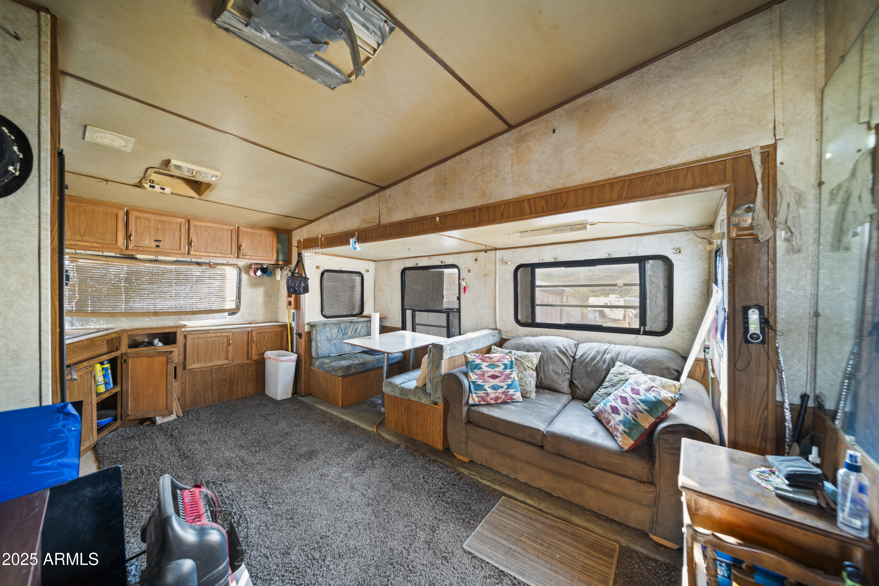 25795 South Old Stage Road Congress, AZ 85332 - Photo 13 of 30 a living room with furniture and a window