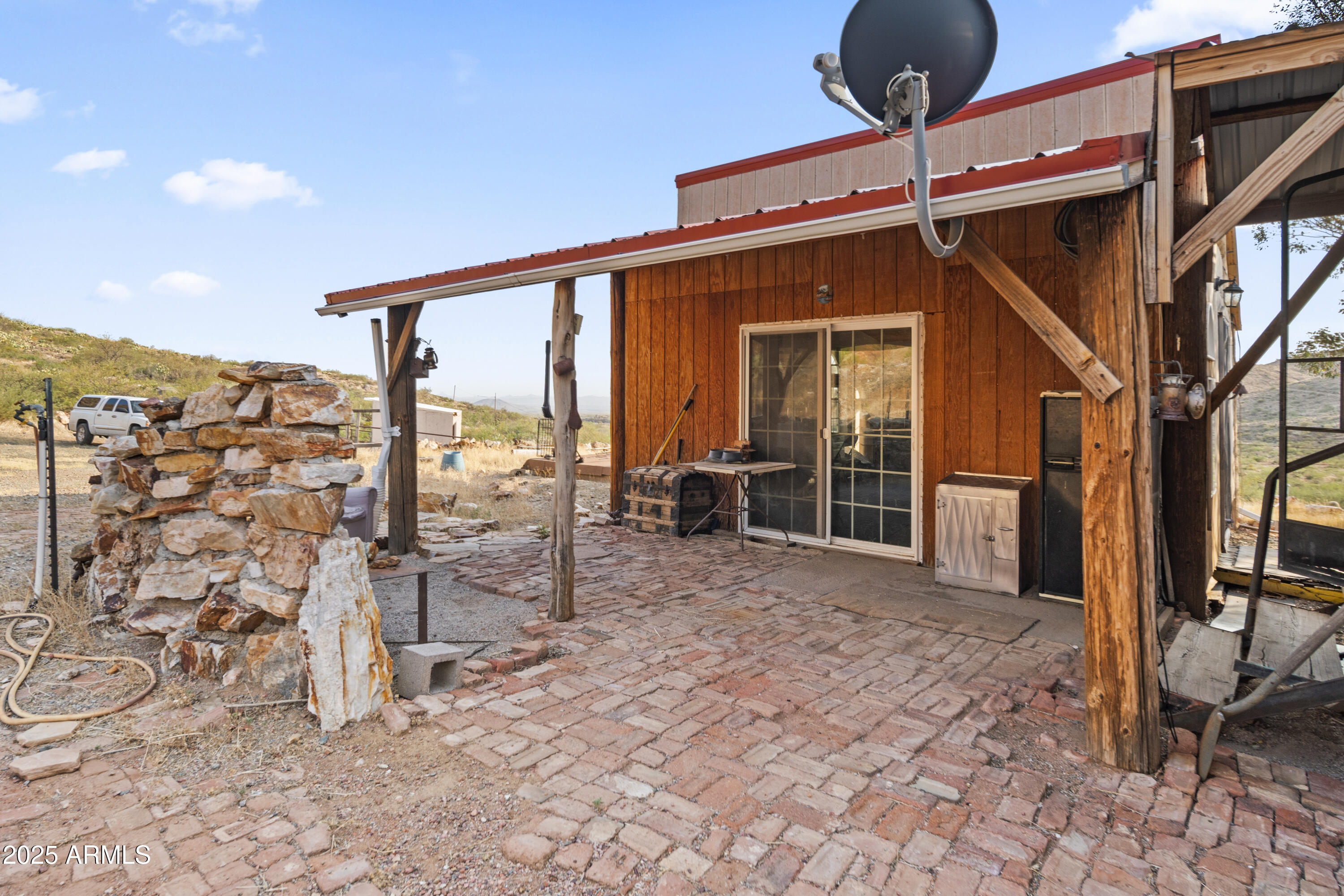 25795 South Old Stage Road Congress, AZ 85332 - Photo 5 of 30 a view of a porch with a table and chairs