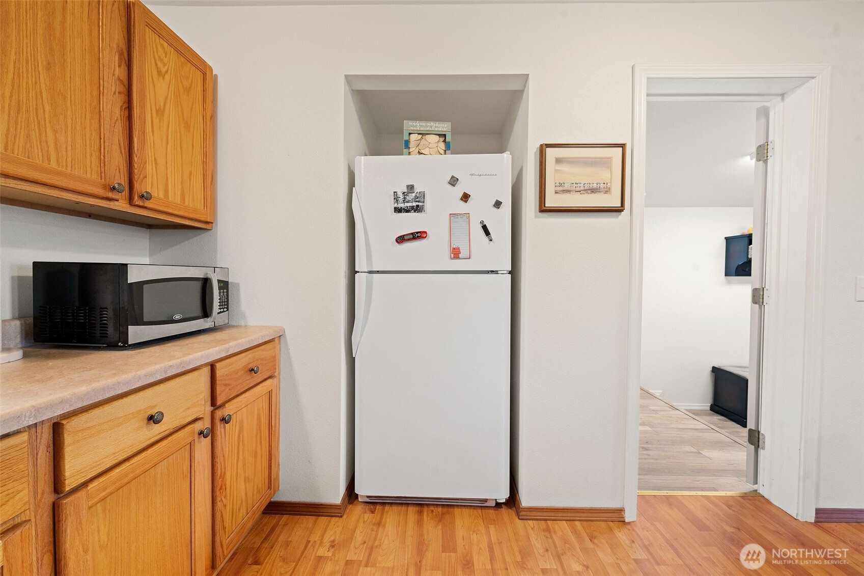 2019 Joe Johns Road Ocean Park, WA 98640 - Photo 15 of 28 a kitchen with stainless steel appliances a refrigerator sink and cabinets