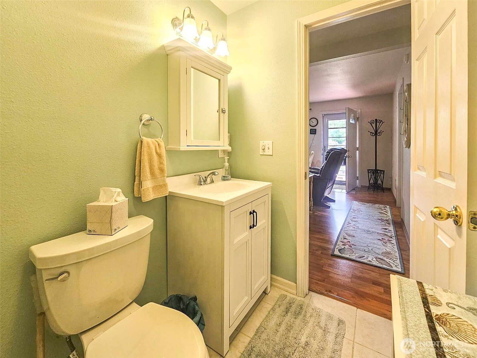 2019 Joe Johns Road Ocean Park, WA 98640 - Photo 21 of 28 a bathroom with a toilet a sink and mirror