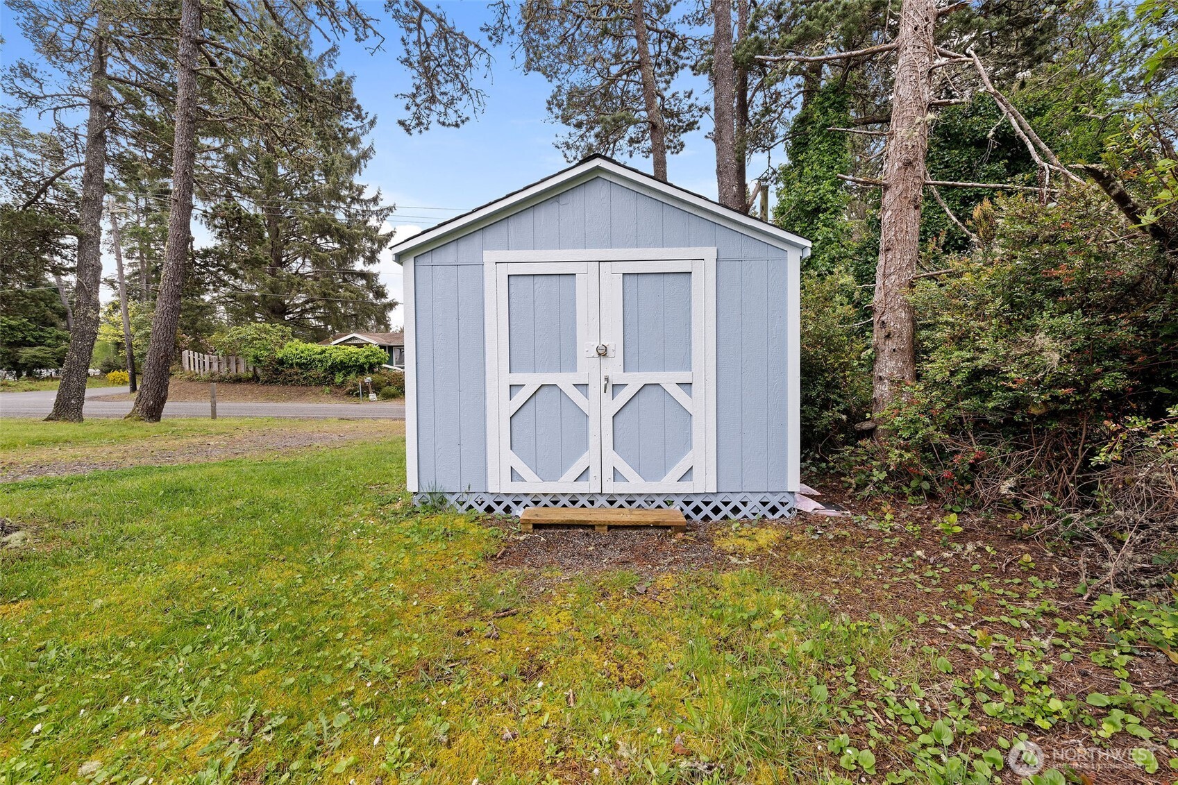 2019 Joe Johns Road Ocean Park, WA 98640 - Photo 26 of 28 a front view of a house with garden