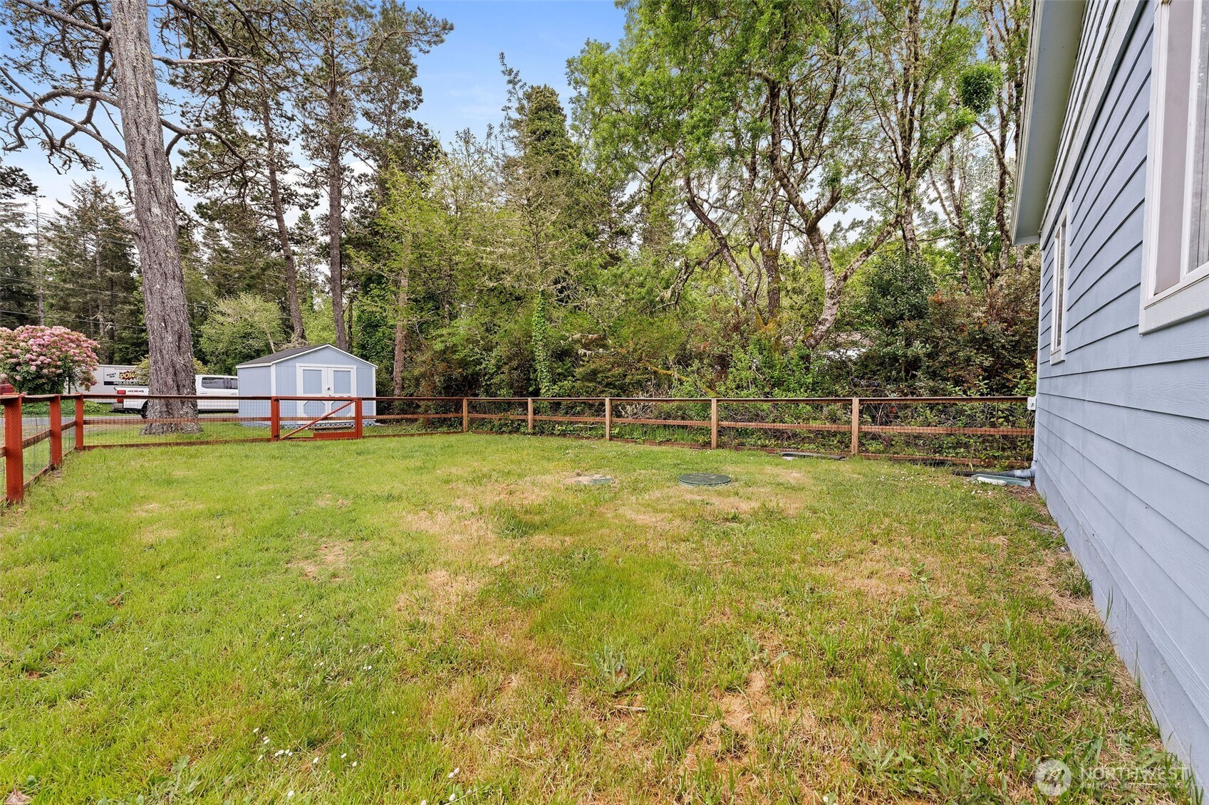 2019 Joe Johns Road Ocean Park, WA 98640 - Photo 5 of 28 a view of a house with a backyard