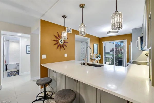 a view of a livingroom with furniture and window