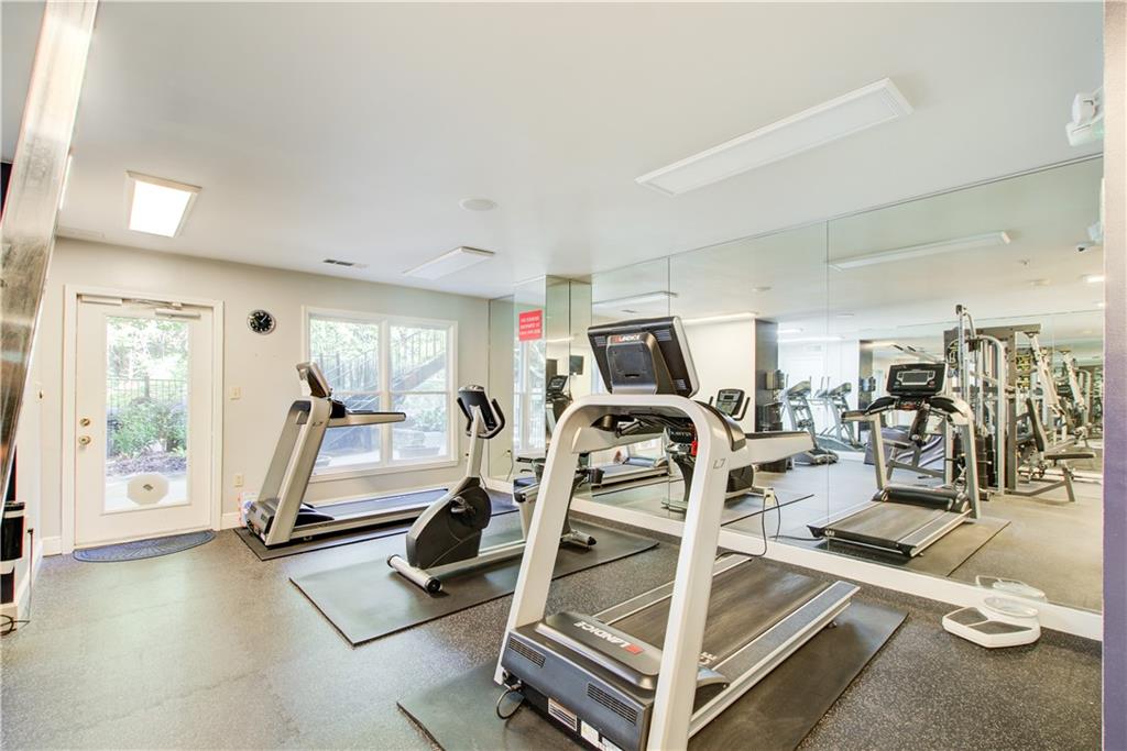 2865 Lenox Road Northeast, Unit 102 Atlanta, GA 30324 - Photo 27 of 35 a view of a room with gym equipment