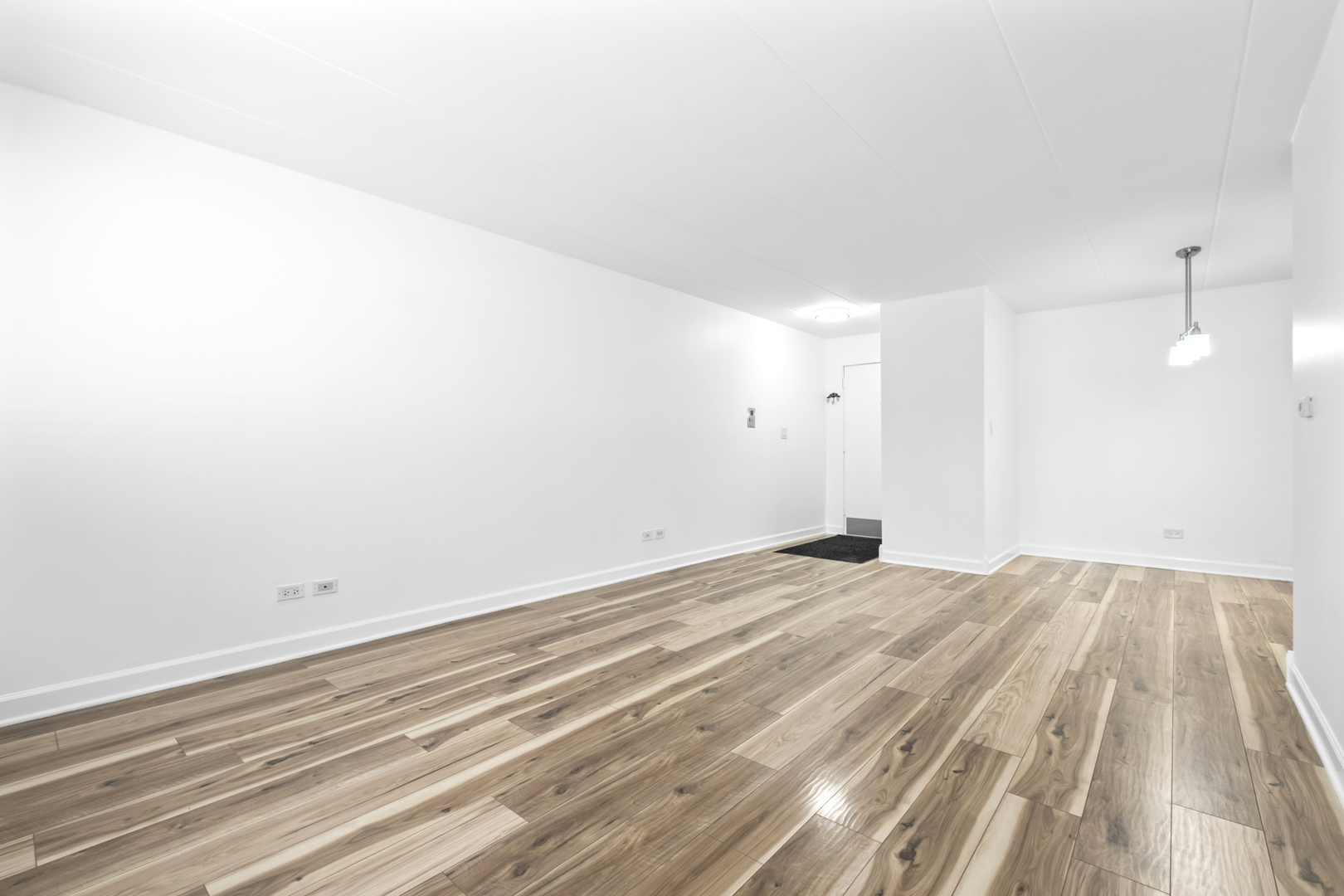 2521 Thatcher Avenue, Unit 2I River Grove, IL 60171 - Photo 11 of 18 a view of empty room with wooden floor