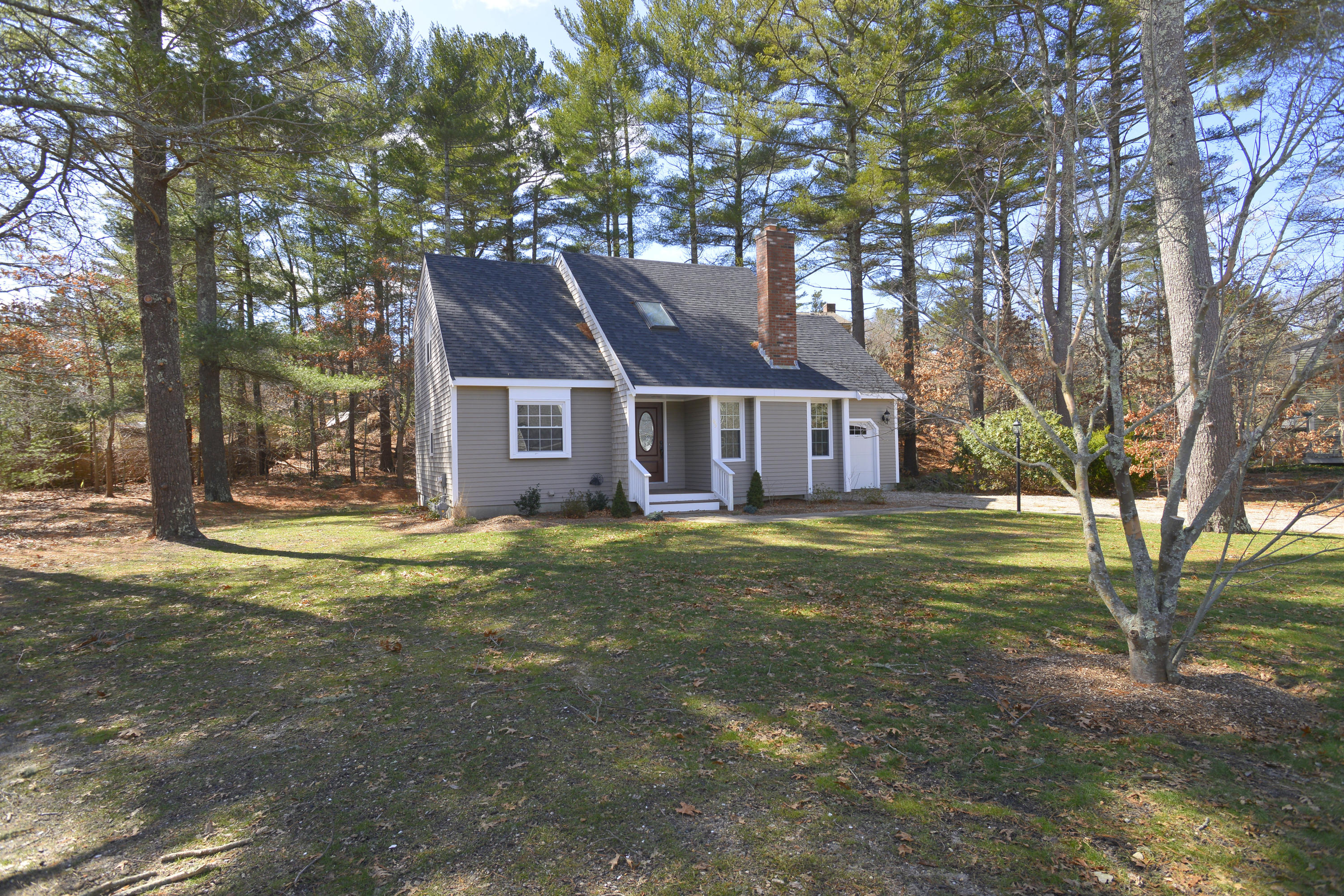 65 Shields Road Mashpee, MA 02649 - Photo 6 of 35 a view of a house with a yard