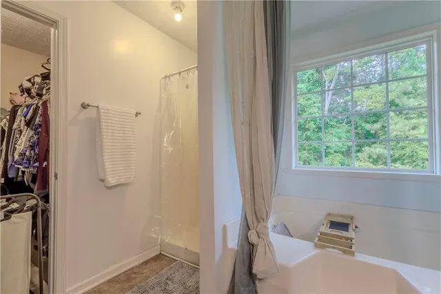 a kitchen with a stove and a refrigerator