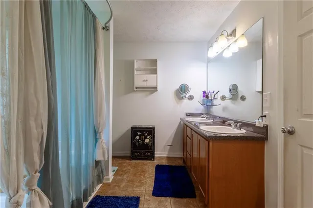 a view of hallway with a mirror