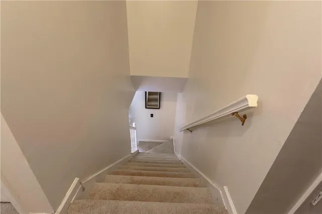 a view of livingroom with furniture and a fireplace