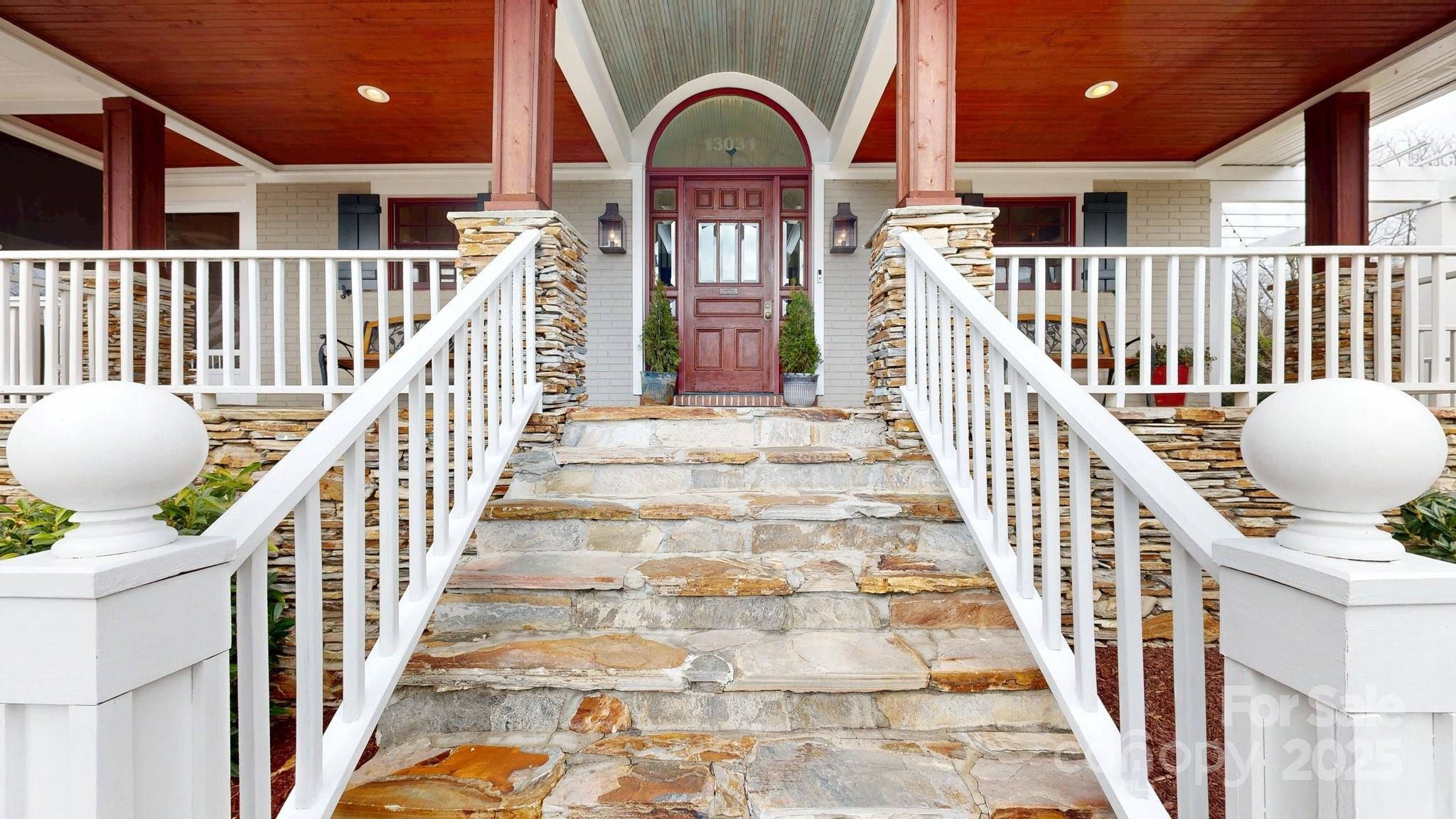 a view of entryway with wooden door