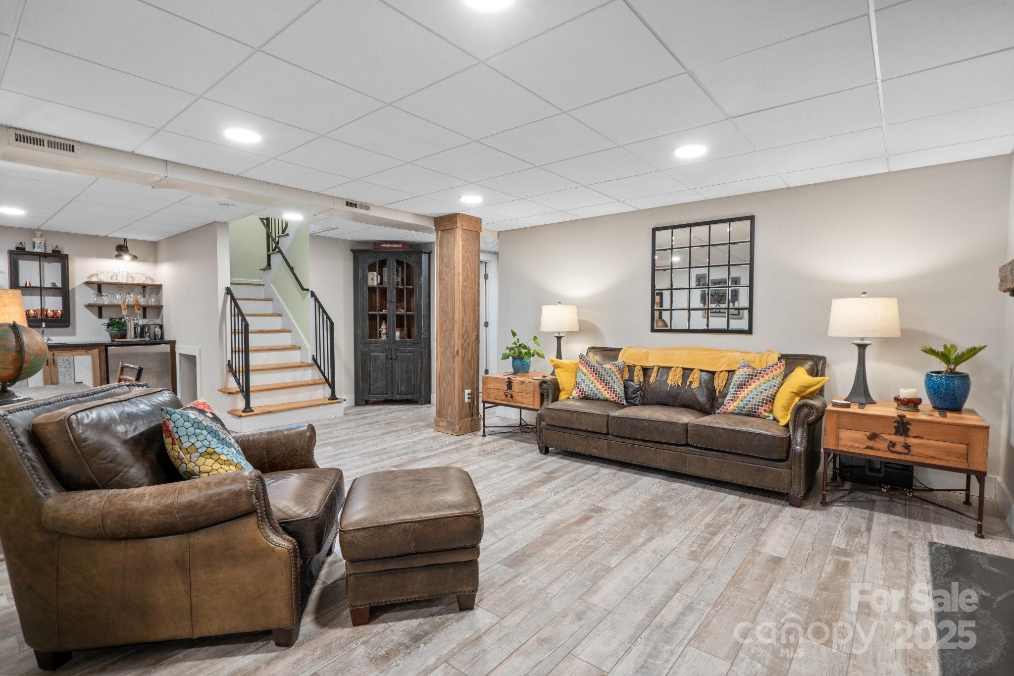 13031 Westmoreland Farm Road Davidson, NC 28036 - Photo 33 of 45 a living room with furniture and a window