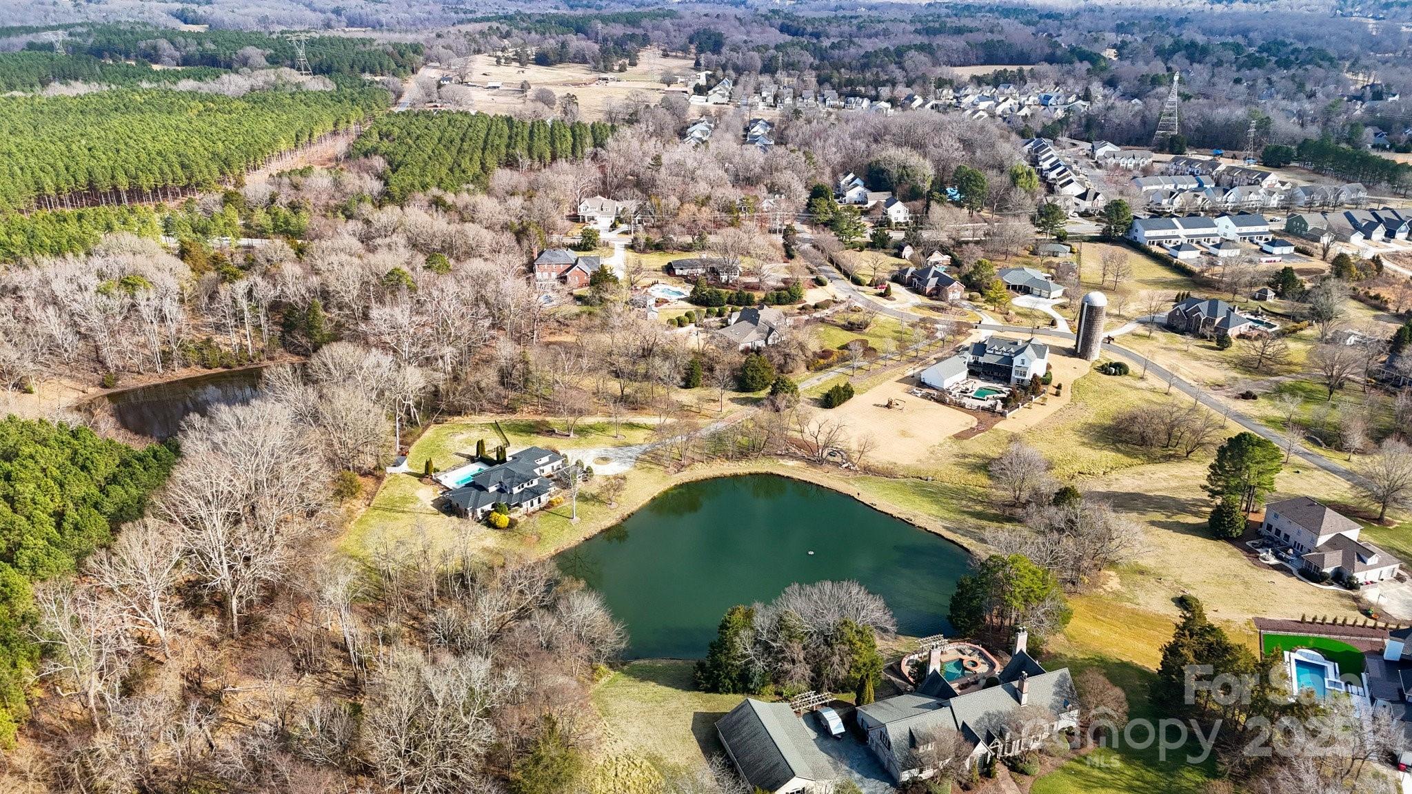 13031 Westmoreland Farm Road Davidson, NC 28036 - Photo 44 of 45 an aerial view of a house with a yard