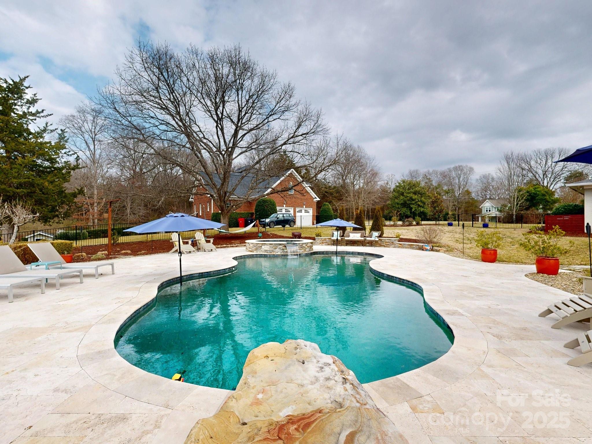 13031 Westmoreland Farm Road Davidson, NC 28036 - Photo 6 of 45 a view of outdoor space and swimming pool