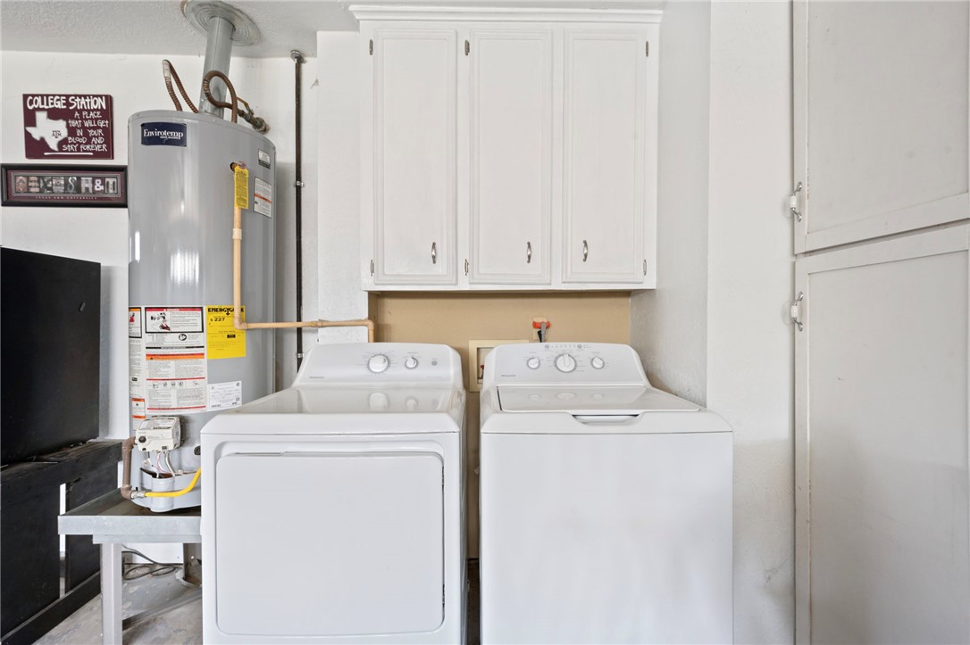 2911 Oakside Drive Bryan, TX 77802 - Photo 16 of 23 a utility room with dryer and washer