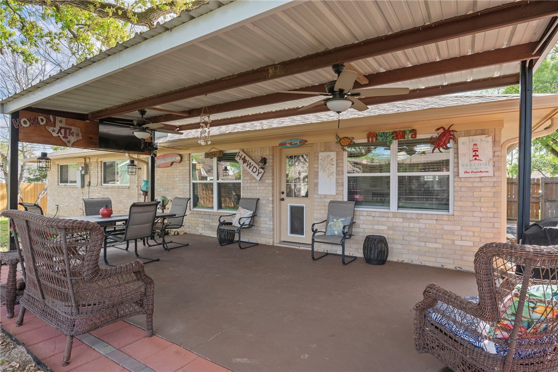 2911 Oakside Drive Bryan, TX 77802 - Photo 19 of 23 a building outdoor space with patio furniture and potted plants