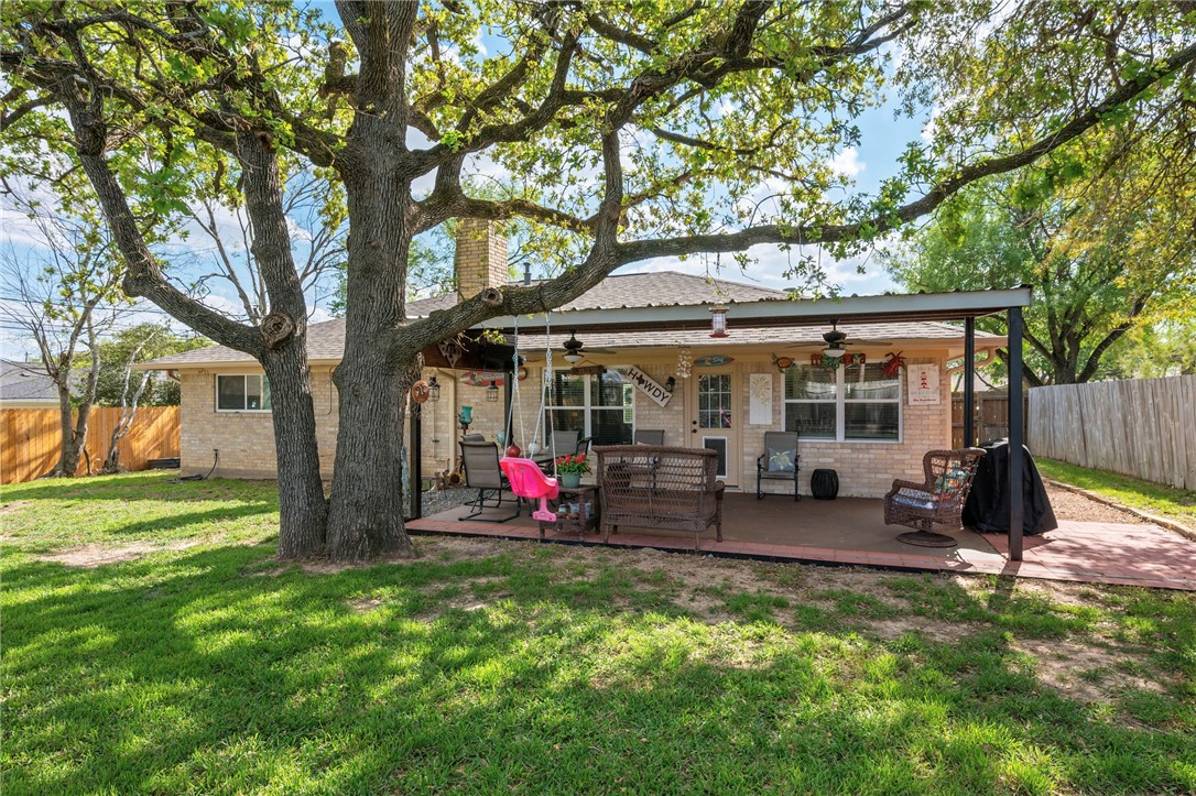2911 Oakside Drive Bryan, TX 77802 - Photo 20 of 23 a view of a house with backyard porch and sitting area