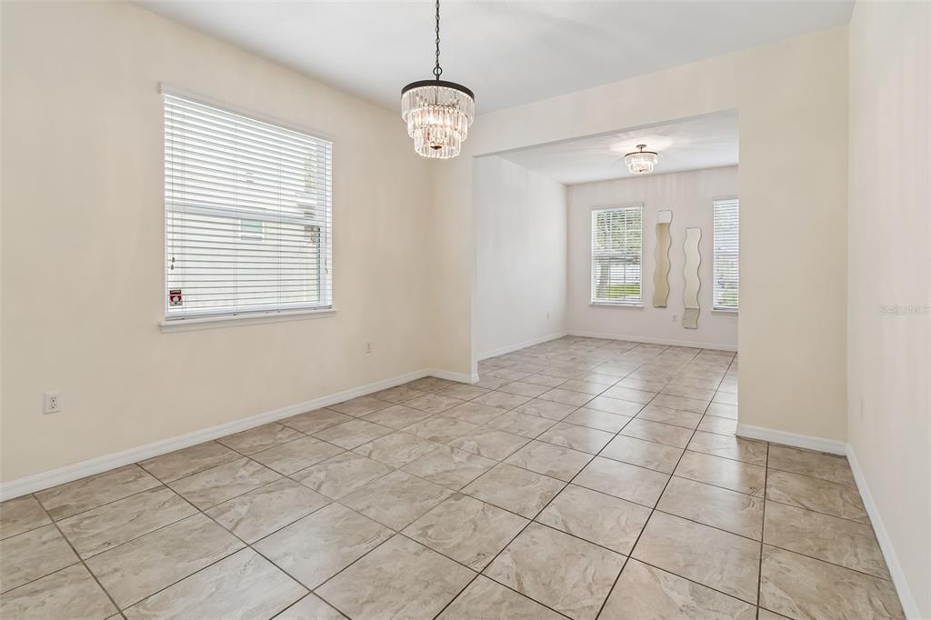 6105 Merrifield Drive Zephyrhills, FL 33541 - Photo 18 of 85 a view of an empty room with a window
