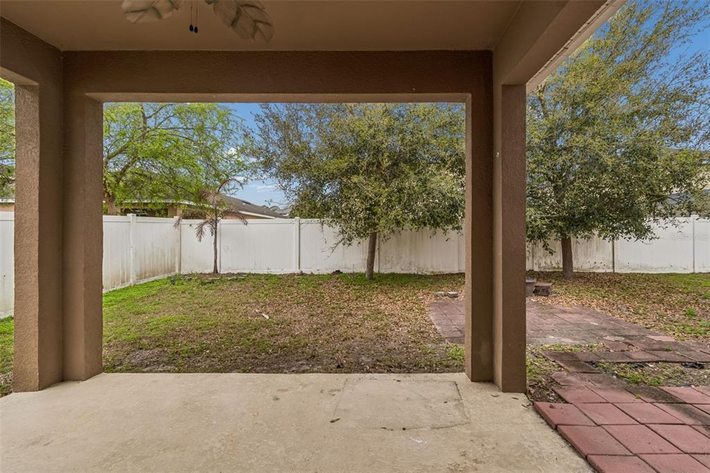 6105 Merrifield Drive Zephyrhills, FL 33541 - Photo 65 of 85 a view of a backyard of the house