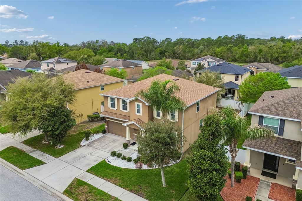 6105 Merrifield Drive Zephyrhills, FL 33541 - Photo 72 of 85 a aerial view of a house with a big yard