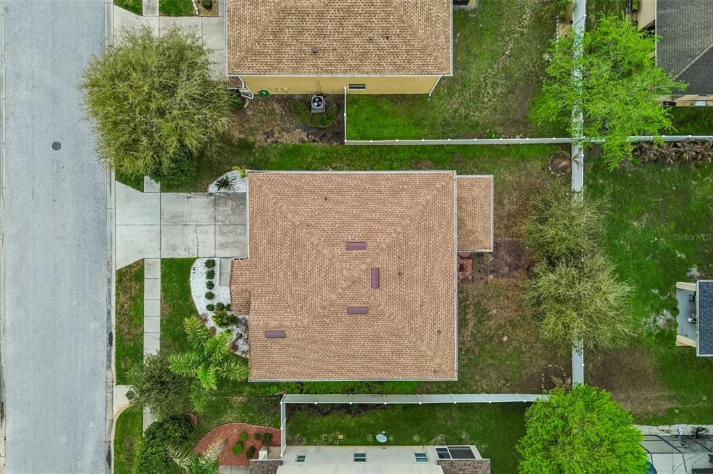 6105 Merrifield Drive Zephyrhills, FL 33541 - Photo 85 of 85 an aerial view of a house with a garden