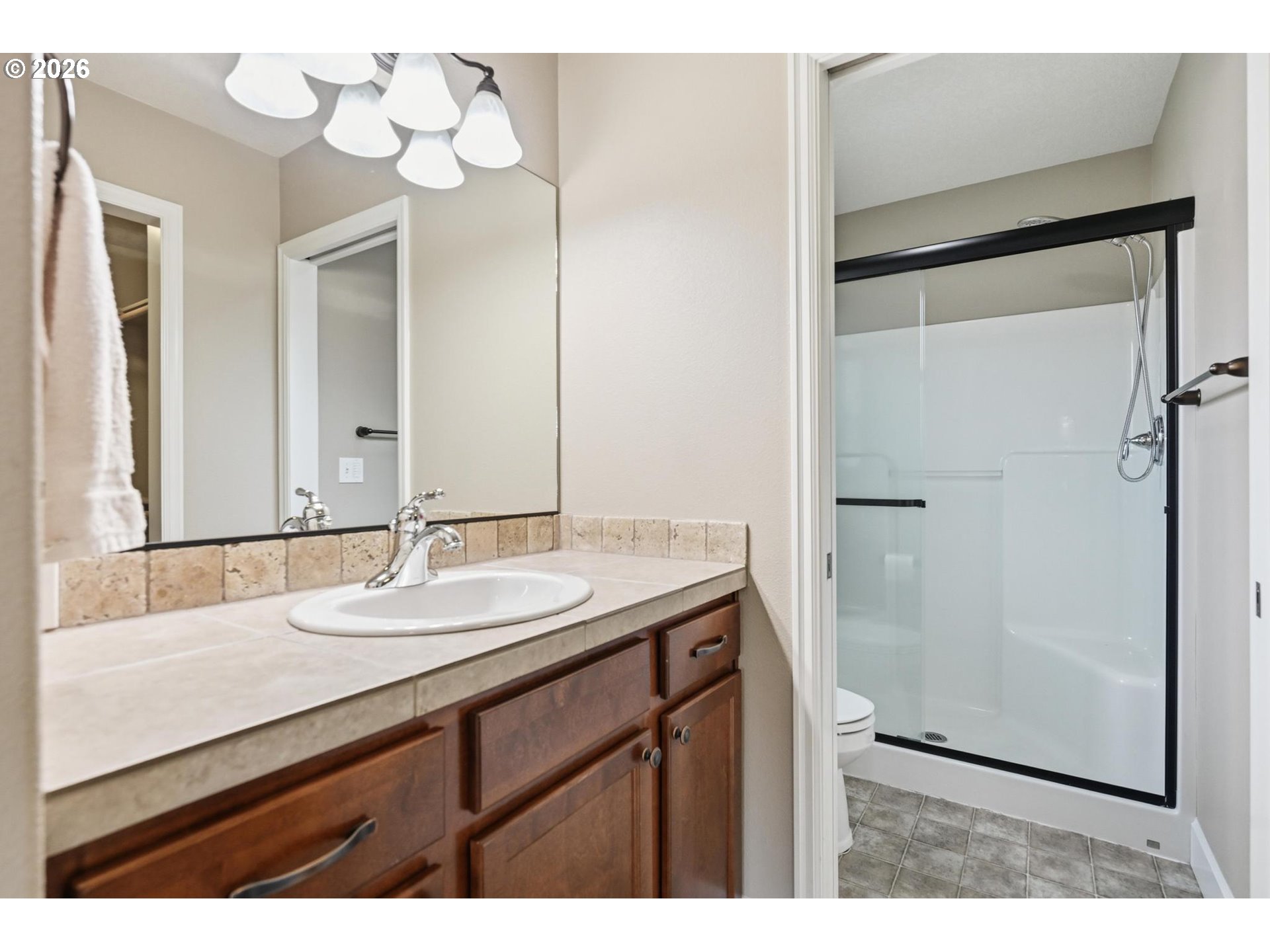 1075 Sage Street Silverton, OR 97381 - Photo 19 of 46 a bathroom with a sink and a mirror