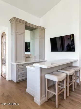 a kitchen with a stove and a microwave