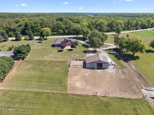 a view of a lake with a yard