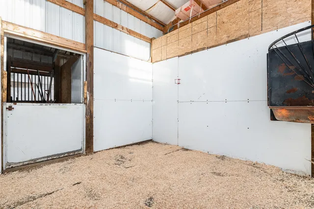 an aerial view of a house with a lake view
