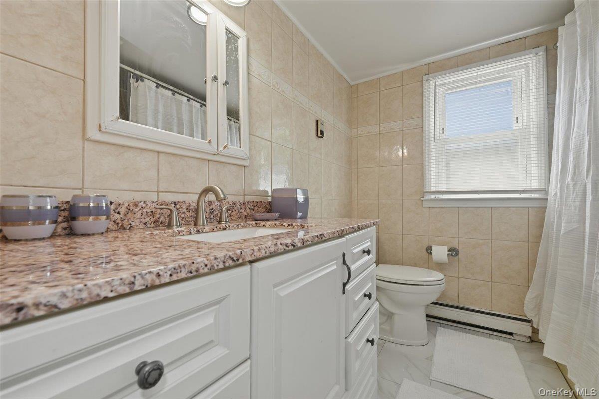 51 Hickory Road Port Washington, NY 11050 - Photo 10 of 16 Bathroom Top Floor