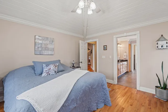 a spacious bathroom with a double vanity sink and a mirror