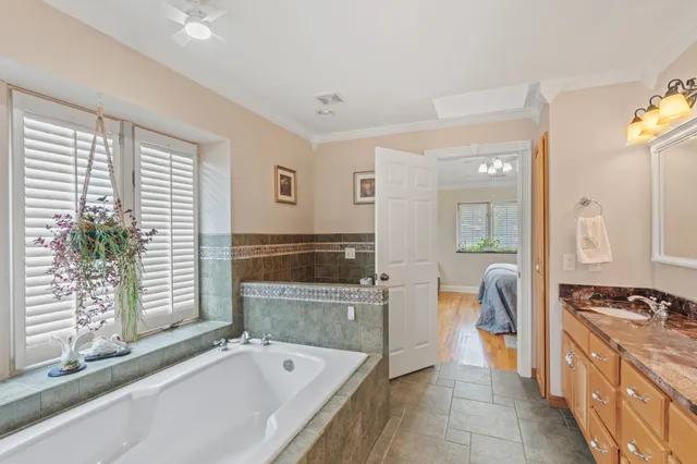 a view of a hallway with wooden shelves