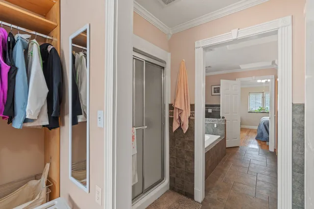 a view of a livingroom with furniture and staircase