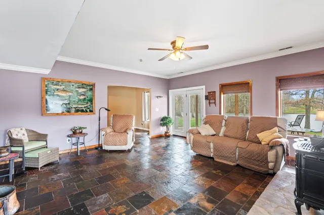 a bedroom with bed and window