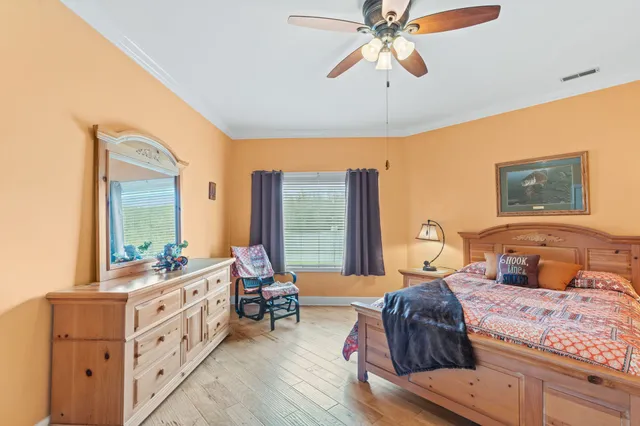 a view of a storage and utility room with washer and dryer