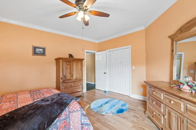 a room with furniture and a flat screen tv