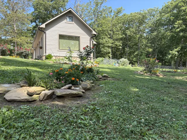 a outdoor space with lots of furniture and toys