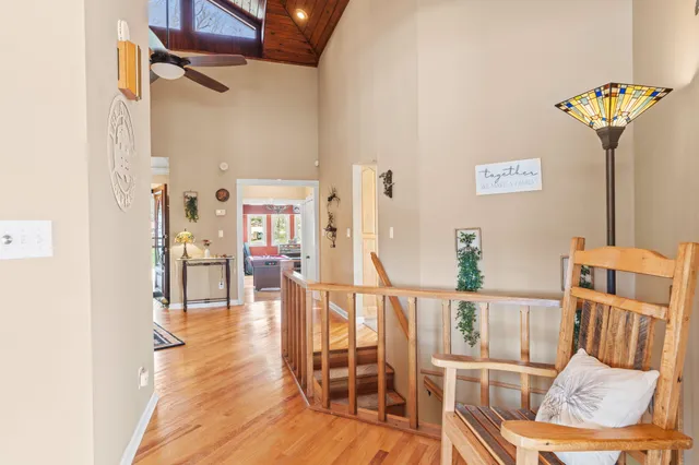 a view of living room kitchen and stainless steel appliances