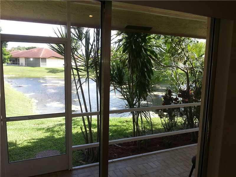 9877 Three Lakes Circle, Unit 8B Boca Raton, FL 33428 - Photo 9 of 21 Exterior Front