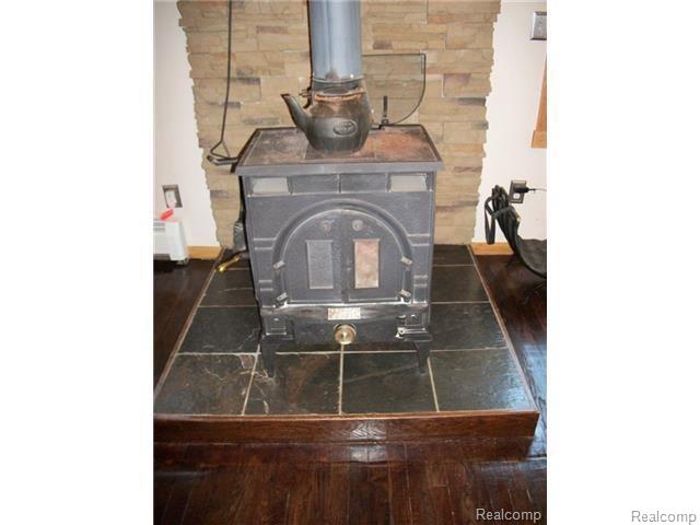 3430 Coon Road Gregory, MI 48137 - Photo 9 of 25 9 Wood Stove.jpg
