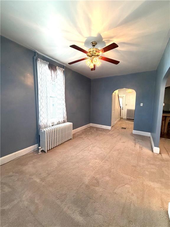 1028 Main Street Republic, PA 15475 - Photo 11 of 27 a view of a livingroom with a ceiling fan and window