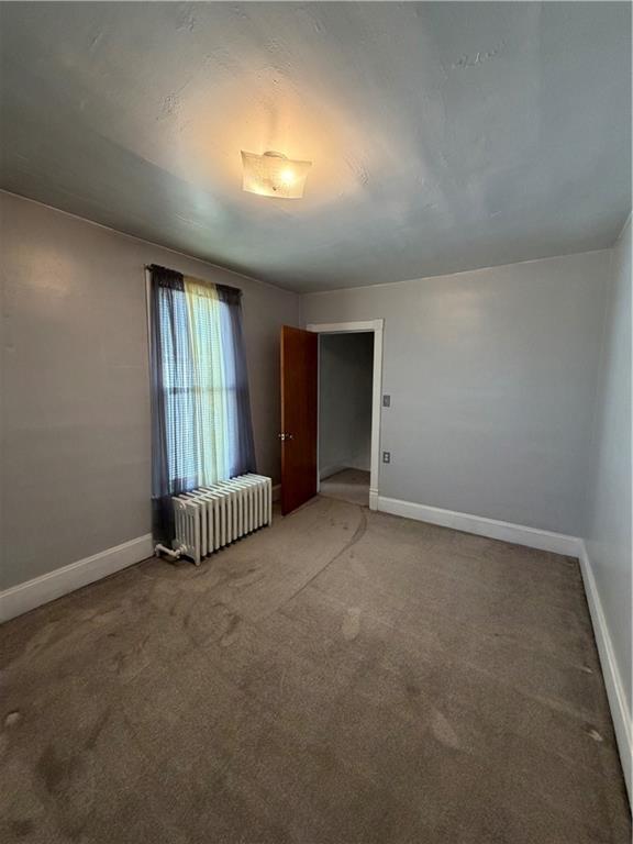 1028 Main Street Republic, PA 15475 - Photo 15 of 27 an empty room with windows