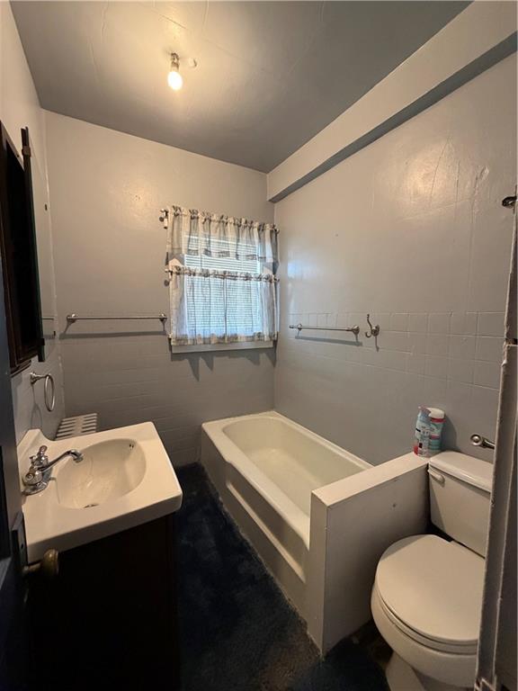 1028 Main Street Republic, PA 15475 - Photo 20 of 27 a bathroom with a toilet sink and mirror