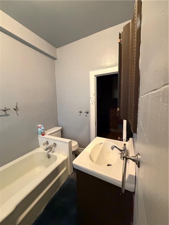 1028 Main Street Republic, PA 15475 - Photo 21 of 27 a bathroom with a sink and a mirror