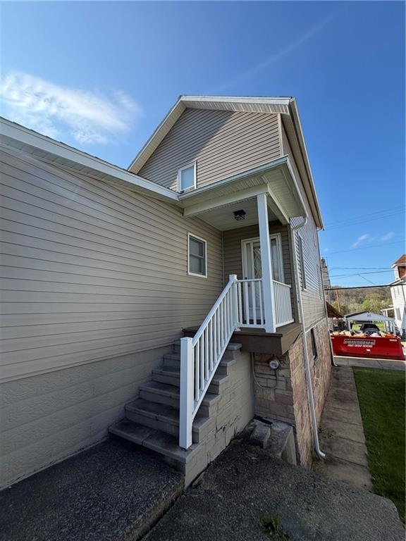 1028 Main Street Republic, PA 15475 - Photo 4 of 27 a view of a house with a yard