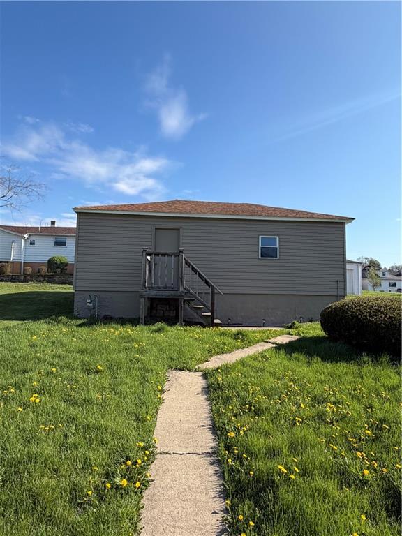 1028 Main Street Republic, PA 15475 - Photo 5 of 27 a backyard of a house with lots of green space and garden