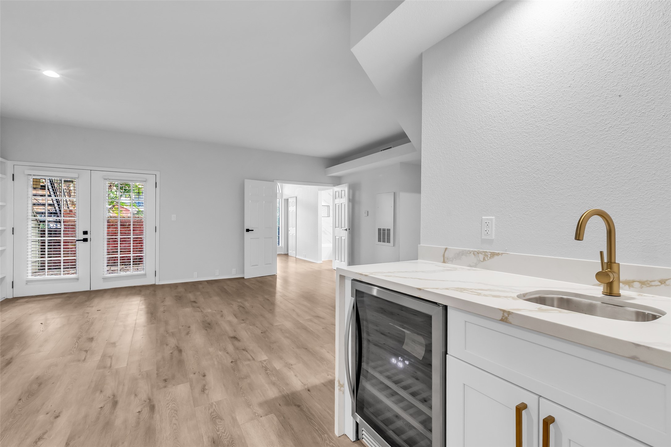 4900 Floyd Street, Unit 10 Houston, TX 77007 - Photo 8 of 30 a view of a kitchen with a sink and a window
