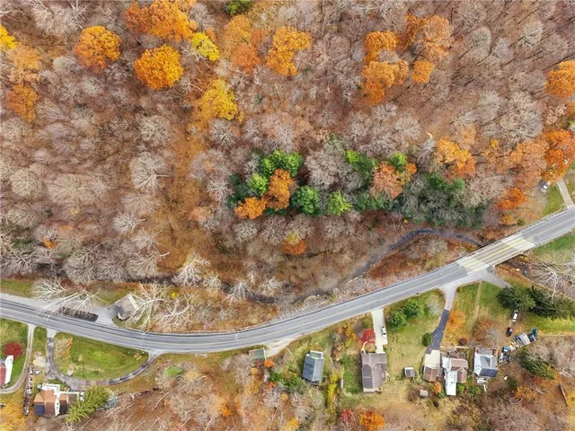 a view of swimming pool from a balcony
