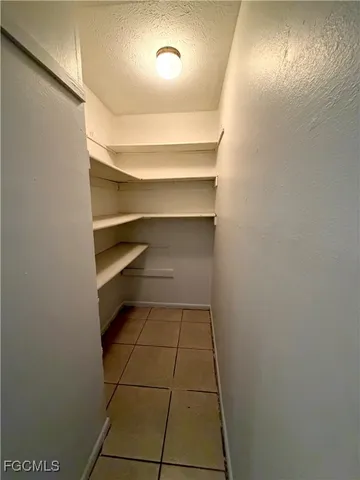 a room with storage and utility