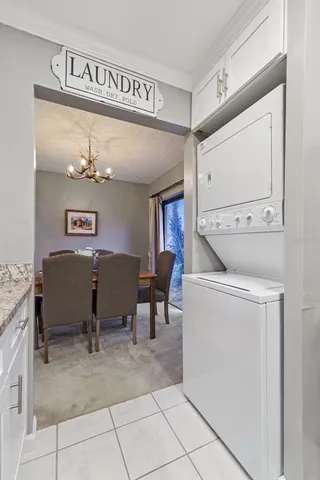 a view of a room with furniture and window